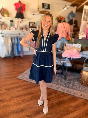 Navy Ruffle Sleeve Tiered Dress w/ White Piping Detail